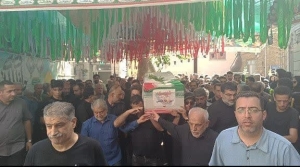 تصویر مراسم تشییع پیکر پاک پاسدار شهید امیر رضا عکسی در روستای خوزنکلا